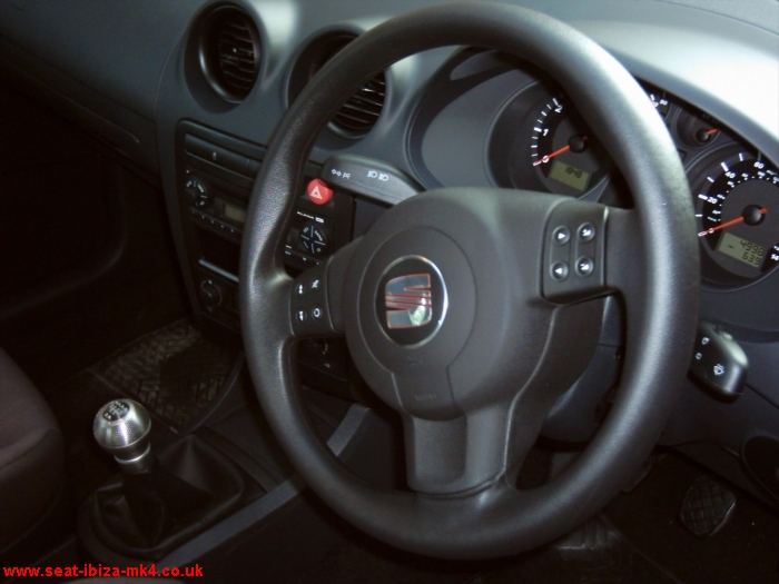 Photo of red Seat Ibiza 1.2 12v SX - interior and steering wheel